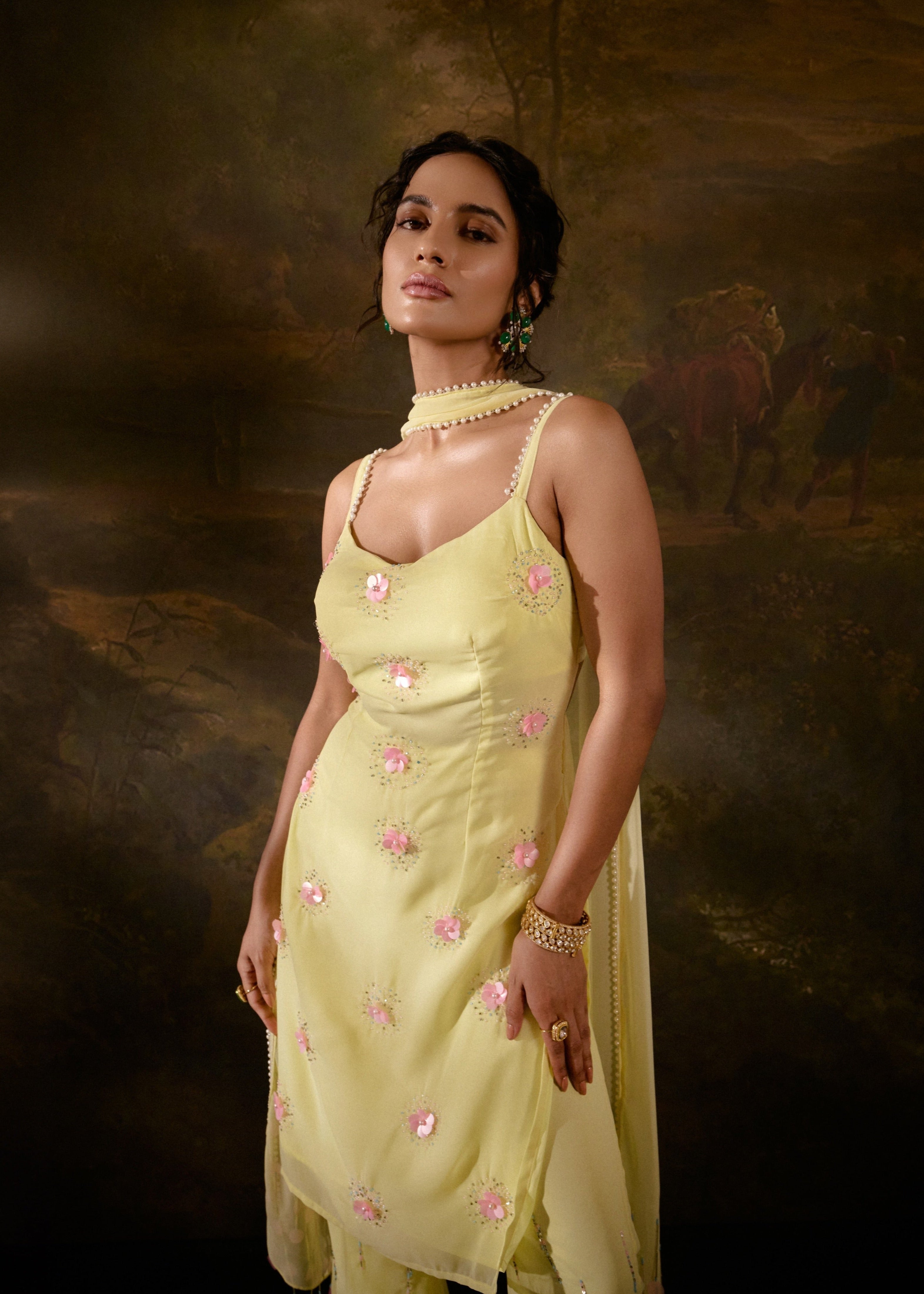 "Chanda Yellow Embroidered Kurta Set: Bright yellow kurta set adorned with intricate embroidery for a traditional yet vibrant look."