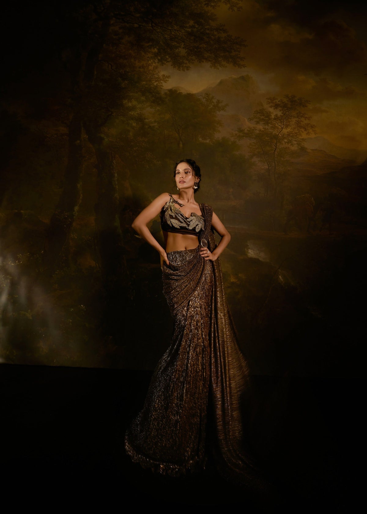 "Zaalima Brown Shimmer Pre-Draped Saree: Shimmering brown pre-draped saree, exuding glamour and sophistication."