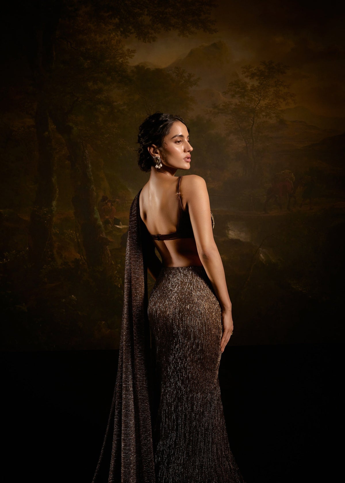 "Zaalima Brown Shimmer Pre-Draped Saree: Shimmering brown pre-draped saree, exuding glamour and sophistication."