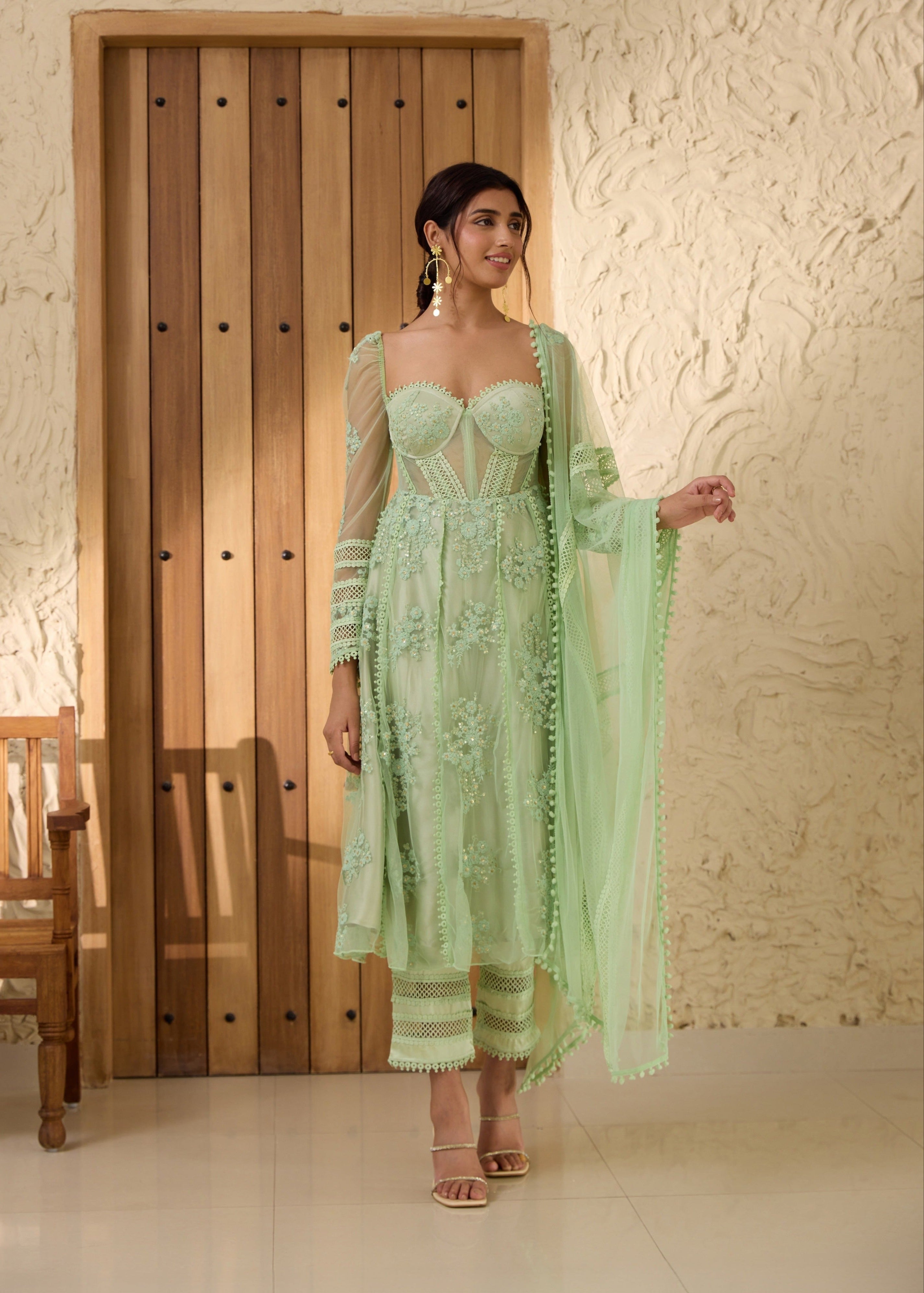 Fariha Green Embroidered Corset Anarkali Suit Set featuring detailed embroidery and a flowing Anarkali silhouette