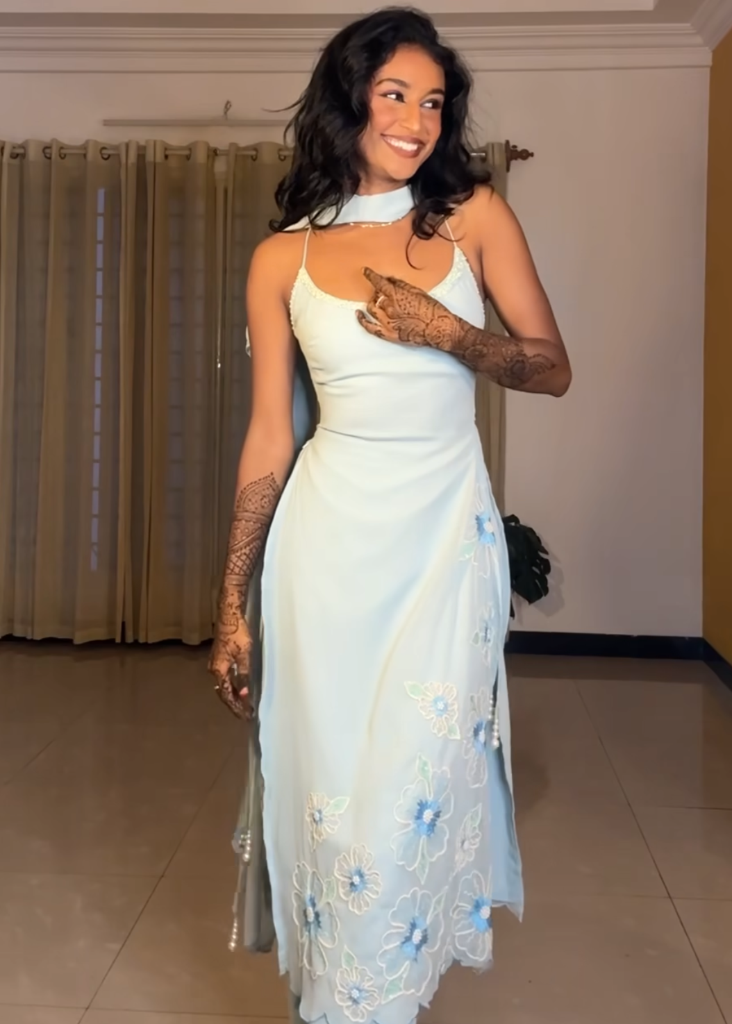 "Raaya Baby Blue Hand-Embroidered Sleeveless Suit: Delicate and charming baby blue suit with intricate hand embroidery and a sleeveless design."