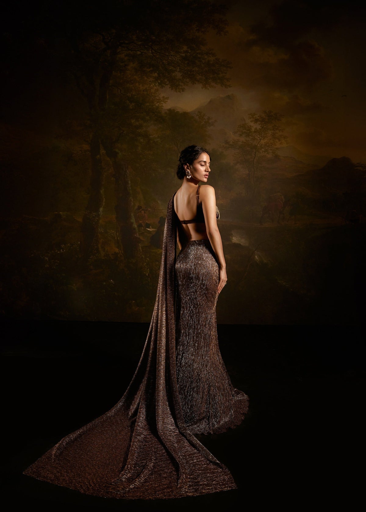 "Zaalima Brown Shimmer Pre-Draped Saree: Shimmering brown pre-draped saree, exuding glamour and sophistication."