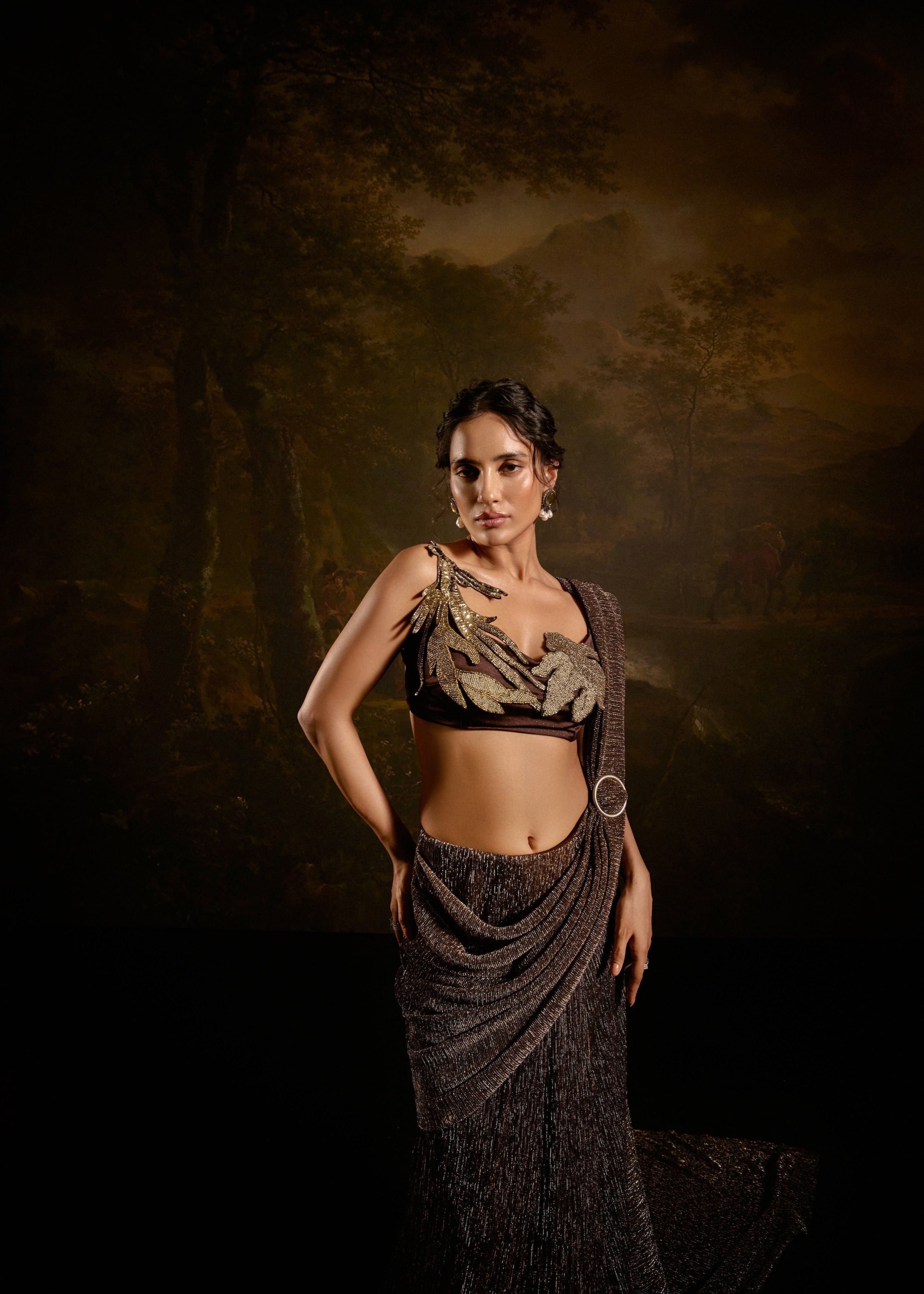 "Zaalima Brown Shimmer Pre-Draped Saree: Shimmering brown pre-draped saree, exuding glamour and sophistication."